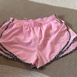 Nike Women's Light Pink Athletic Shorts with Floral Trim